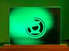 Green Lantern image laser engraved onto acrylic and edge lit with green led tape
